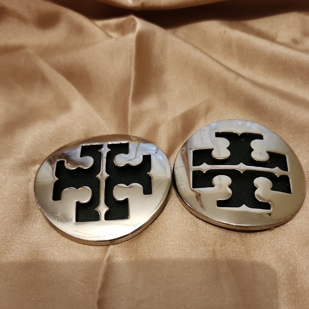Tory Burch Silver & Black Logo Buckles. These are in decent condition. Scratches